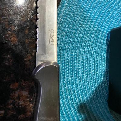 Set of Ginsu knives in knife block