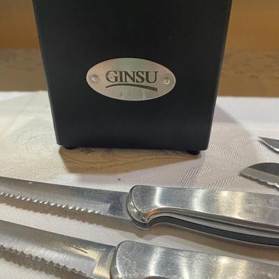 Set of Ginsu knives in knife block