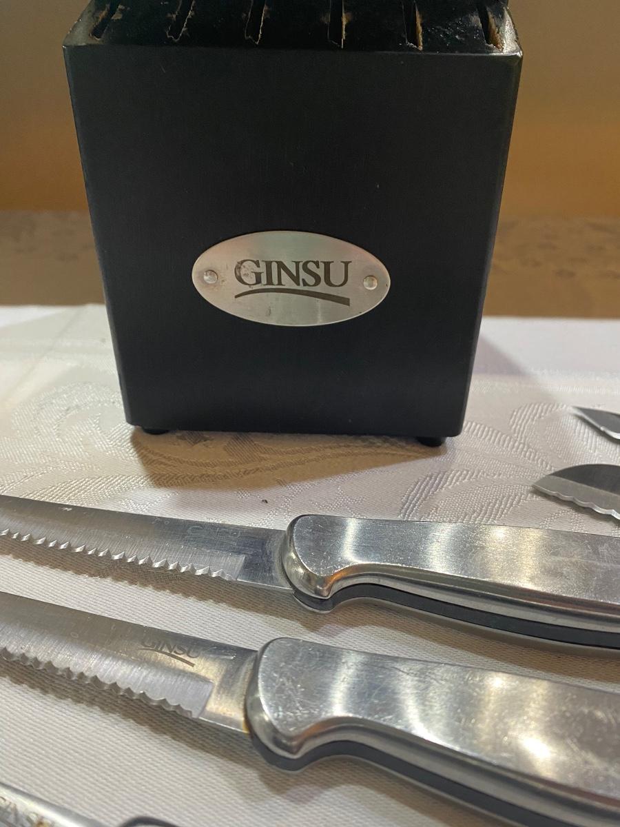 Set of Ginsu knives in knife block