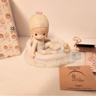Lot #32  Precious Moments Figurine "August" in Box