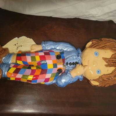 Ceramic wall hanging- boy in patchwork pants