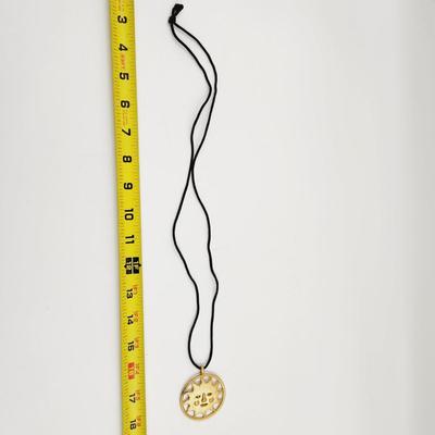 LARGE GOLD TONED SUN PENDANT W/ CLOTH NECKLACE
