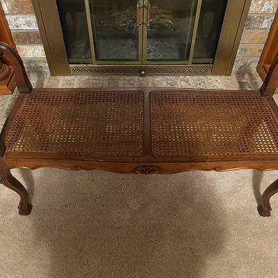 Vintage wood and cane bench
