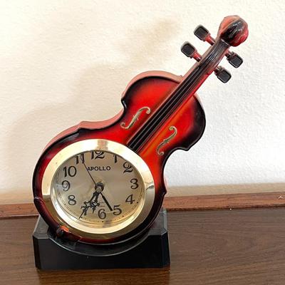 LOT 132  PLASTIC CASE BASS FIGURAL QUARTZ CLOCK