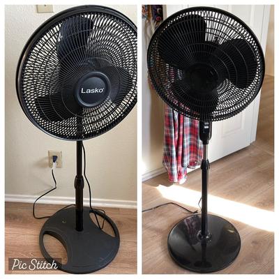 LOT 157  TWO UPRIGHT ADJUSTABLE ELECTRIC FANS