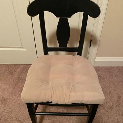 Black, slightly distressed wooden desk chair