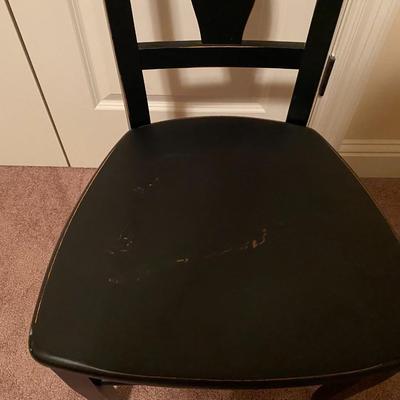 Black, slightly distressed wooden desk chair