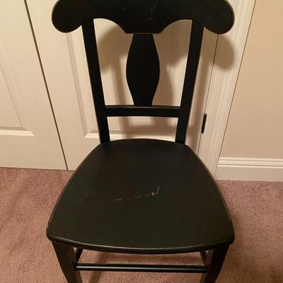 Black, slightly distressed wooden desk chair