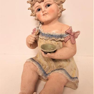 Lot #71  Antique Bisque Porcelain Piano Baby