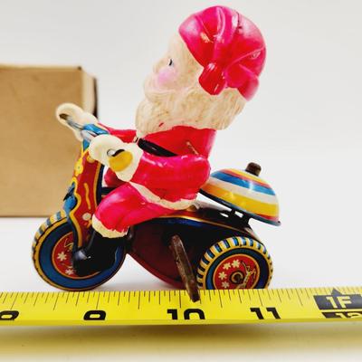 VINTAGE SANTA CELLULOID WIND UP ON TRICYCLE