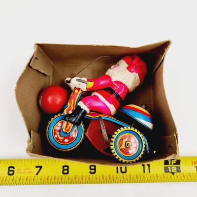 VINTAGE SANTA CELLULOID WIND UP ON TRICYCLE
