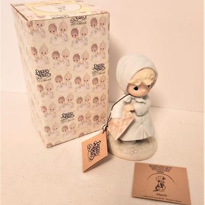 Lot #87  Precious Moments Figurine "March" - with box/tags