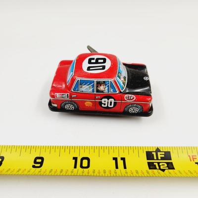VINTAGE ALL THAT TIME TIN PLATE BENZ STP SPRING MADE TOY