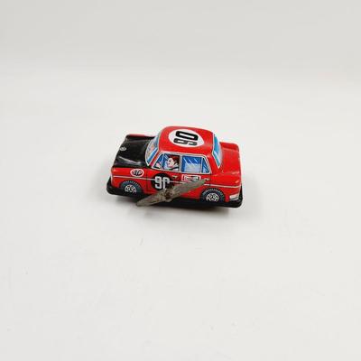 VINTAGE ALL THAT TIME TIN PLATE BENZ STP SPRING MADE TOY