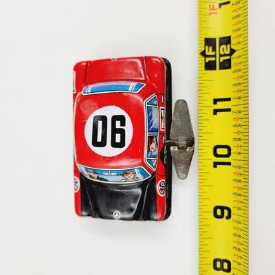 VINTAGE ALL THAT TIME TIN PLATE BENZ STP SPRING MADE TOY