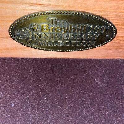 All-wood Broyhill 100 Anniversary Collection 8-drawer dresser with beveled mirror
