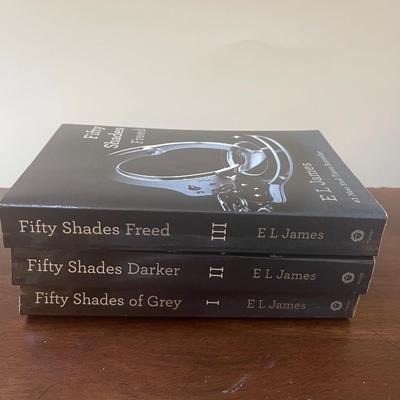 Fifty Shades of Grey trilogy book collection. Included book holder.