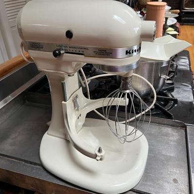 White KitchenAid Mixer with Accessories