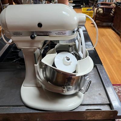 White KitchenAid Mixer with Accessories
