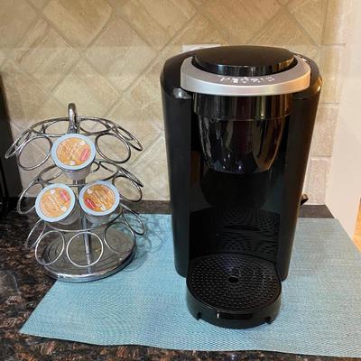 Keurig coffee maker with pod holder