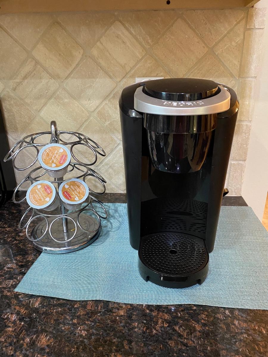 Keurig coffee maker with pod holder
