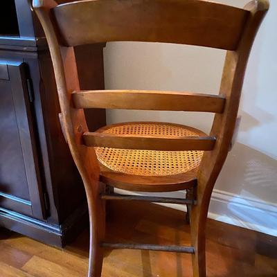 Pair of vintage solid wood chairs with cane seat