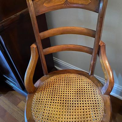 Pair of vintage solid wood chairs with cane seat
