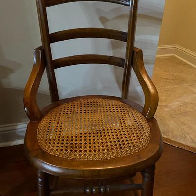Pair of vintage solid wood chairs with cane seat