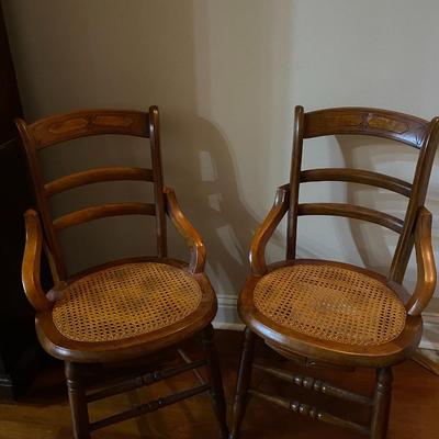 Pair of vintage solid wood chairs with cane seat