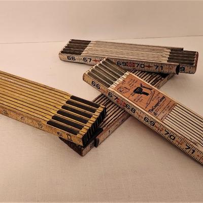 Lot #146  Lot of 4 72" folding rulers