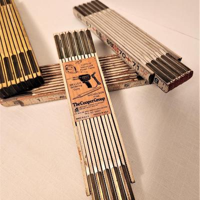 Lot #146  Lot of 4 72" folding rulers