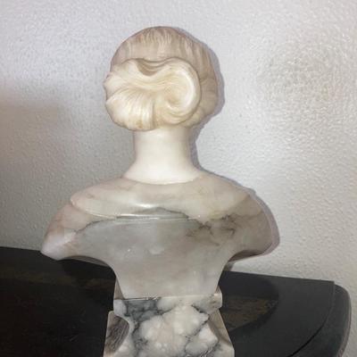 Pair of small white stone busts