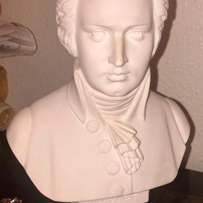 Pair of small white stone busts