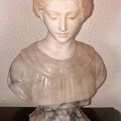 Pair of small white stone busts