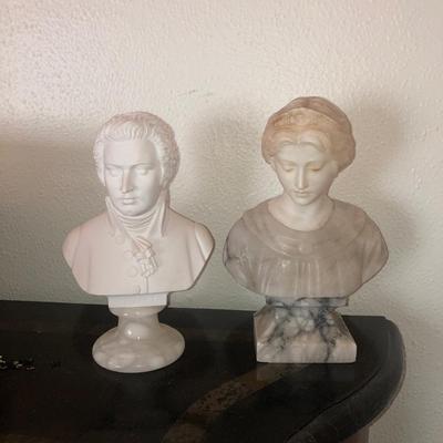 Pair of small white stone busts