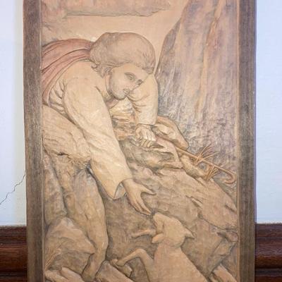 Pair of religious motif carved wood wall plaques