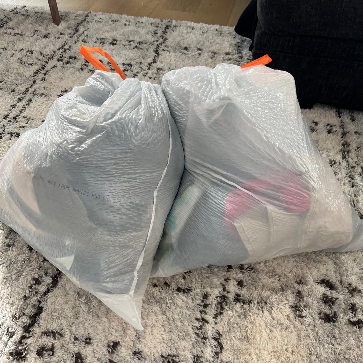 2 bags of clothes womens and kids