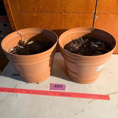 Pair of Plastic Terra Cotta colored flower pots