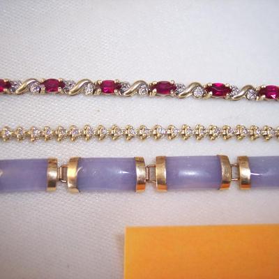 Lot of 3 Gold & Gemstone Bracelets.
