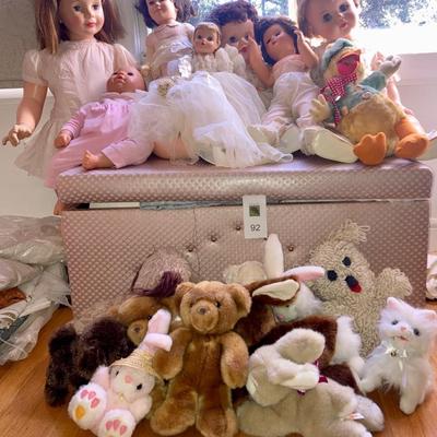 Lot of vintage dolls and stuffed animals