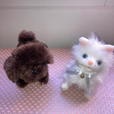Lot of vintage dolls and stuffed animals