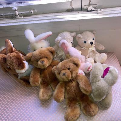 Lot of vintage dolls and stuffed animals