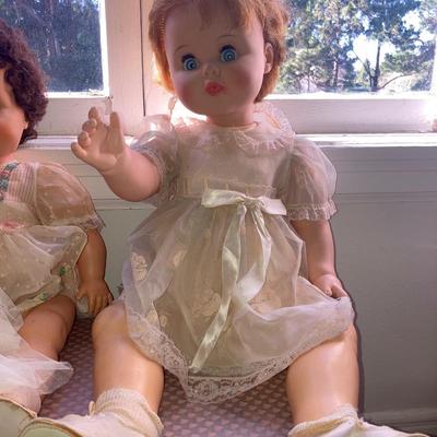 Lot of vintage dolls and stuffed animals