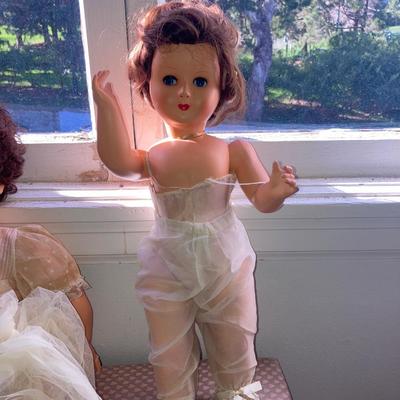 Lot of vintage dolls and stuffed animals