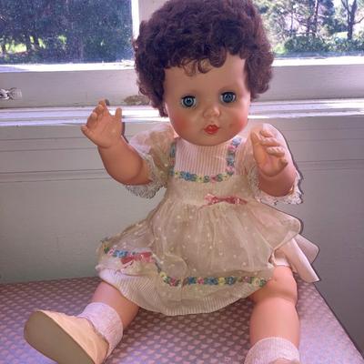 Lot of vintage dolls and stuffed animals