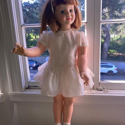 Lot of vintage dolls and stuffed animals