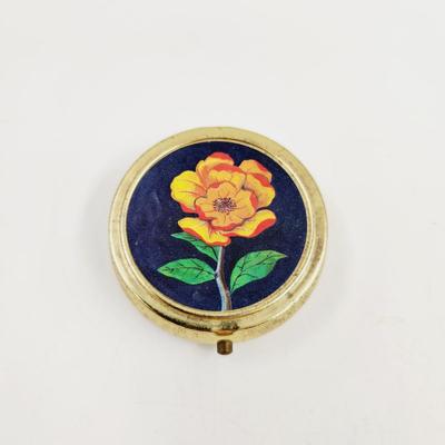 BRASS FLOWER PILL BOX THAT IS ROUND