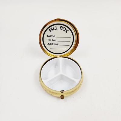 BRASS FLOWER PILL BOX THAT IS ROUND