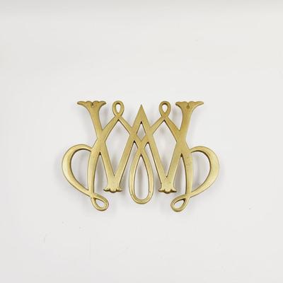 W OR M BRASS TRIVET ðŸ˜€
