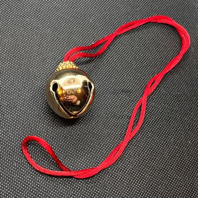CHRISTMAS BELL ON SILKY RED ROPE